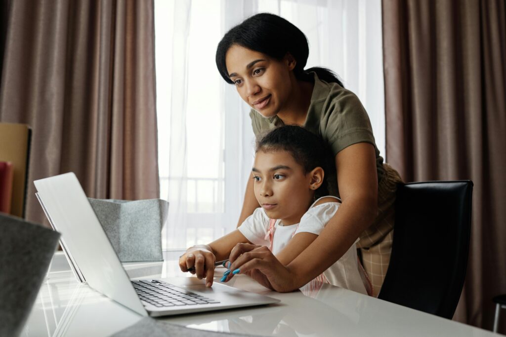 A tutor helping a homebased IGCSE Kenyan student putting at hand the 7 simple steps on IGCSE homeschooling in Kenya.